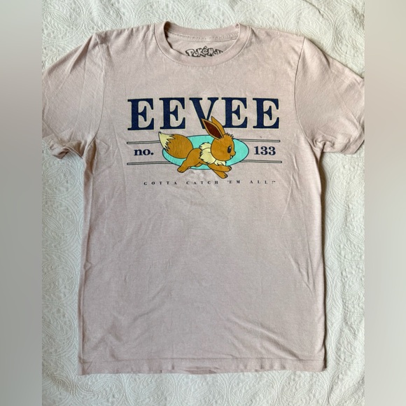 Pokemon Tops - Eevee Pokémon “Gotta Catch ‘Em All!” Cream Graphic T-Shirt Anime Size Small